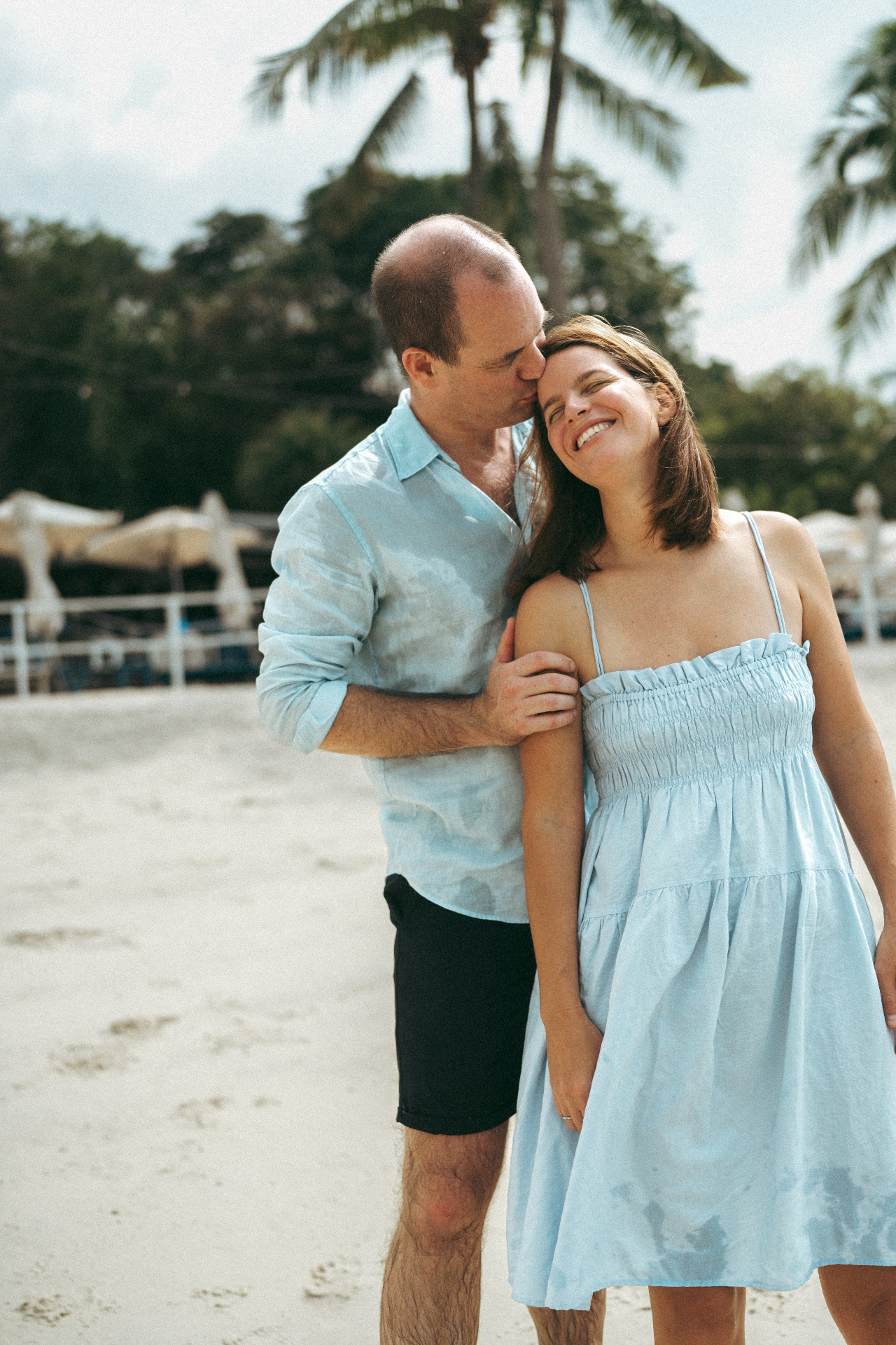 The founder and her husband on the beach